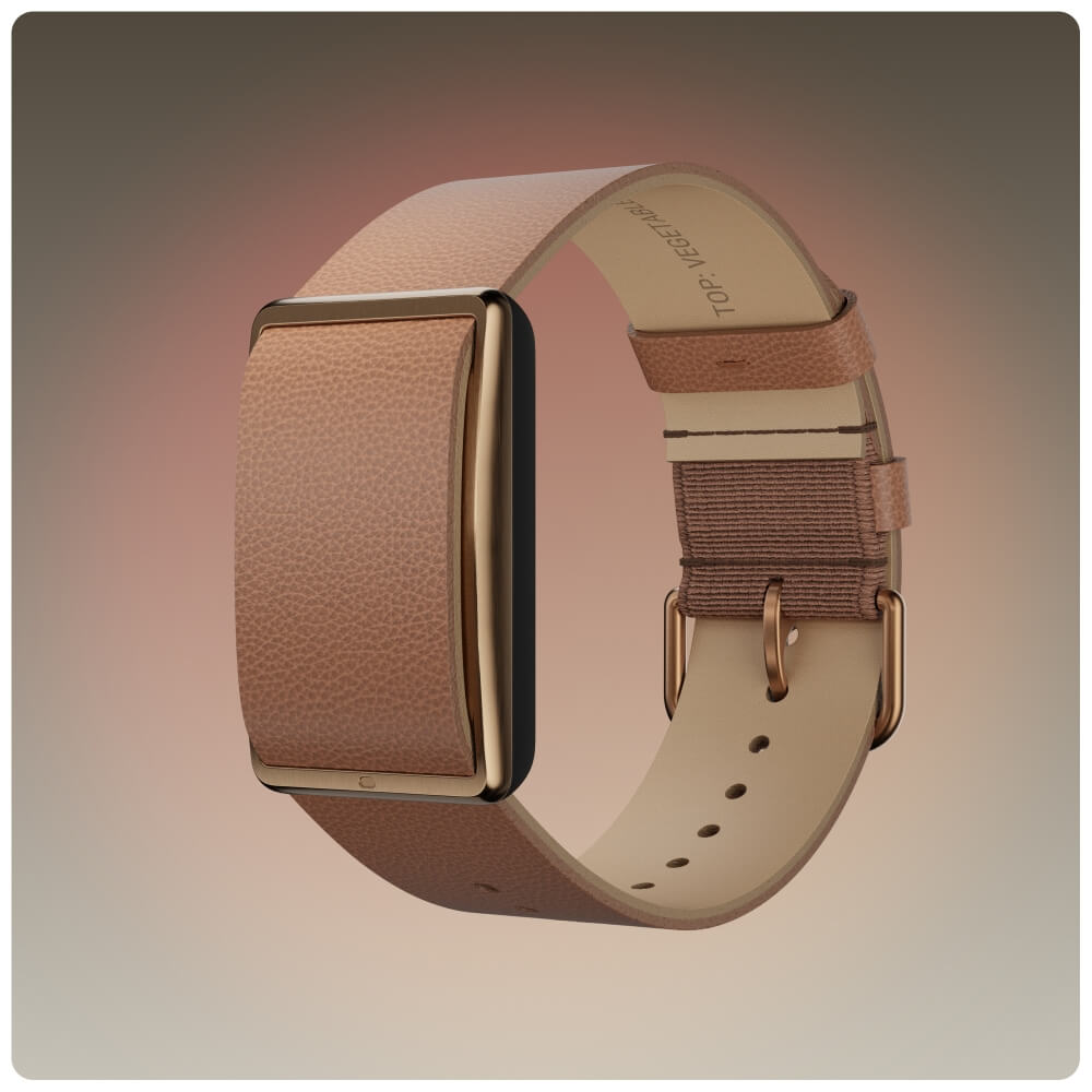Produktbild des POLAR Loop Fitness Trackers mit braunem Echtlederarmband im Profil. Gut sichtbar sind die feine Narbenstruktur des Leders, das goldfarbene Gehäuse und die klassische Dornschnalle mit Lederschlaufen.